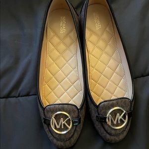 Brown and Black Michael Kors flats